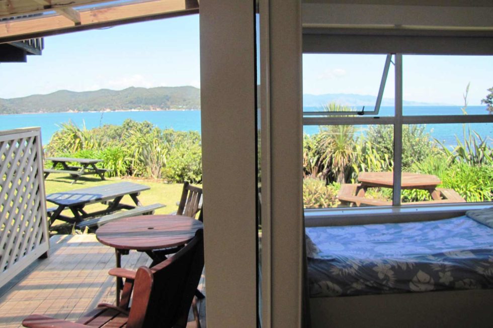 Accommodation with sea views of Tryphena harbour and the Coromandel